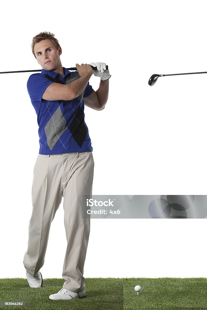 Man playing golf Man playing golfhttp://www.twodozendesign.info/i/1.png 20-29 Years Stock Photo