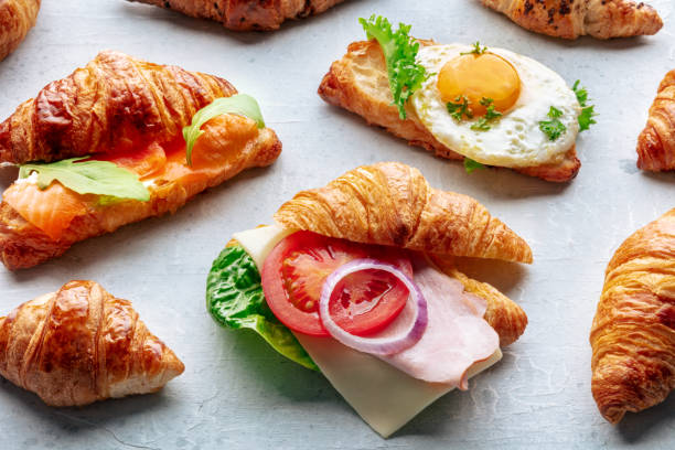 istock Croissant sandwich assortment. Various stuffed croissants. Filled rolls 1830664376