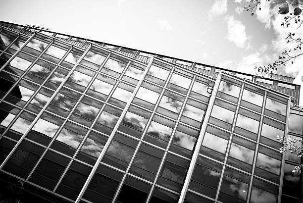 istock contemporary oslo building skyscraper reflecting in facade - monochrome 183066873
