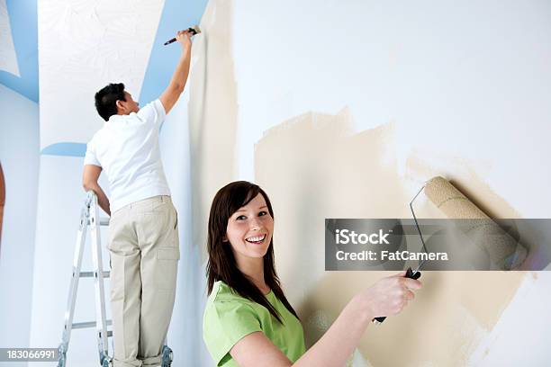 Painting Together Stock Photo - Download Image Now - 20-24 Years, 20-29 Years, 25-29 Years