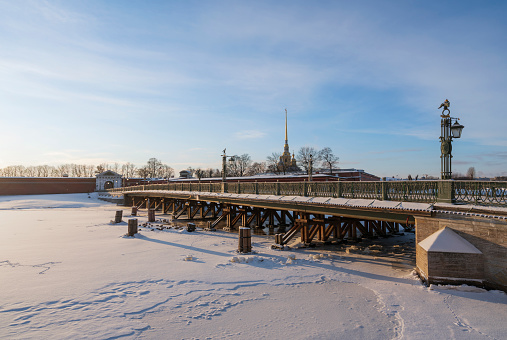 View of the Ioanovsky Bridge across the Kronversky Bayou and the Peter and Paul Fortress on a frosty winter morning, St. Petersburg, Russia