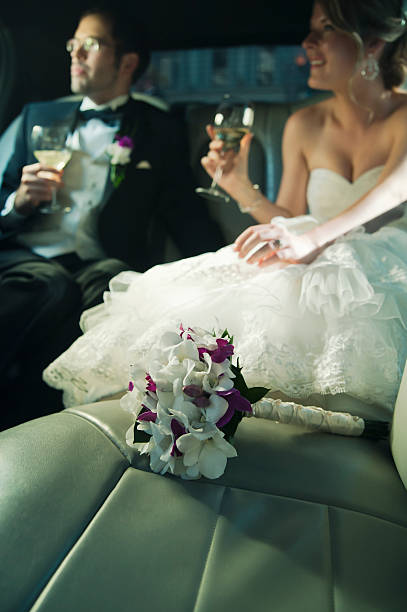 istock Newlyweds in the limousine 183067784