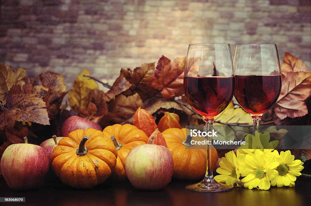 Red Wine with Autumn Decoration Red Wine with Autumn Decoration  - toned image - selective focus Autumn Stock Photo