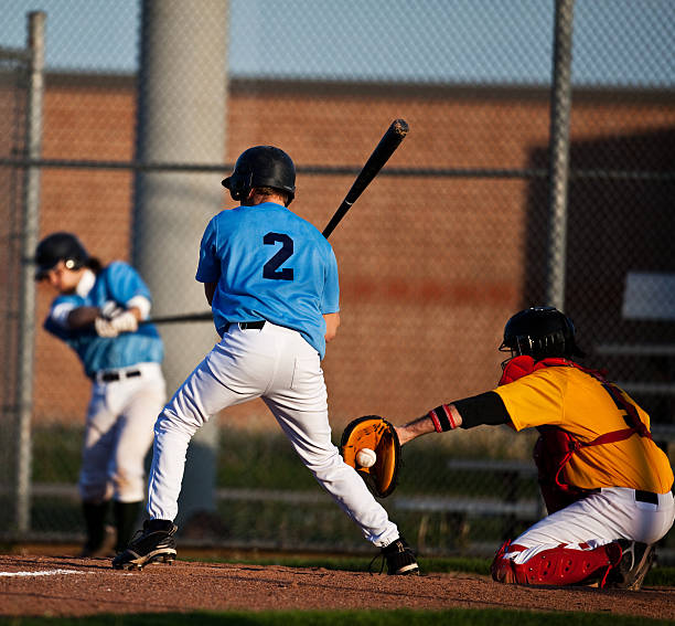 istock a young man is up for bat in baseball 183068516