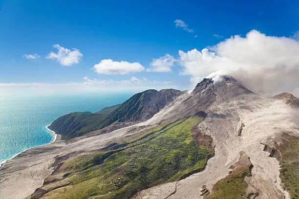 The active Soufriere Hills Volcano in Montserrat seen from helicopter.