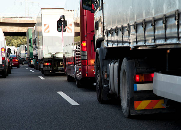 Highway Traffic Jam Cars and Trucks stuck in traffic jam ozone layer photos stock pictures, royalty-free photos & images