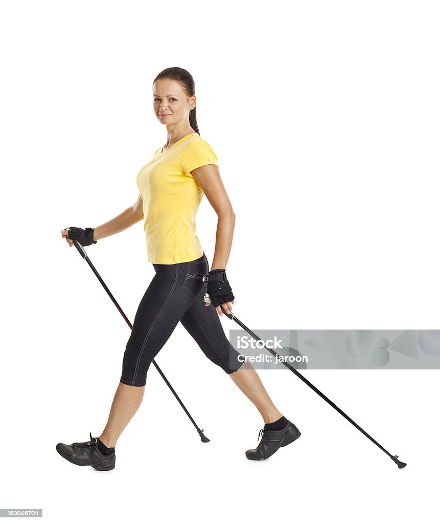 Adulto atraente mulher exercícios Caminhada Nórdica - Royalty-free Caminhada Nórdica Foto de stock