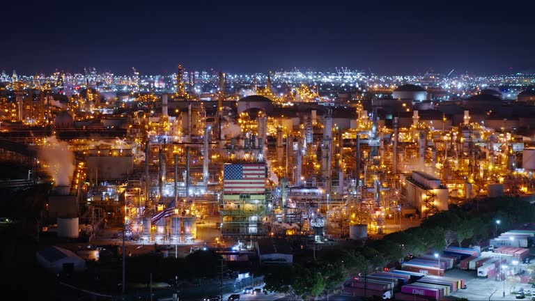 Retreating Aerial Shot of Oil Refinery in Wilmington, California at Night