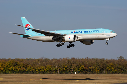 Budapest, Hungary - October 17, 2021: Korean Air Cargo Boeing 777-200 cargo plane at airport. Air freight and shipping. Aviation and aircraft. Transport industry. Transportation. Fly and flying.