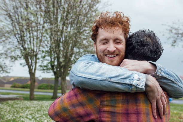 istock Same Sex Couple Hugging Each Other 1830704529