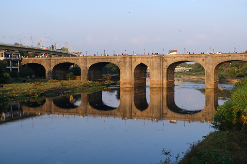 Panoramic view of picturesque bridge over dry river in Mahad, India