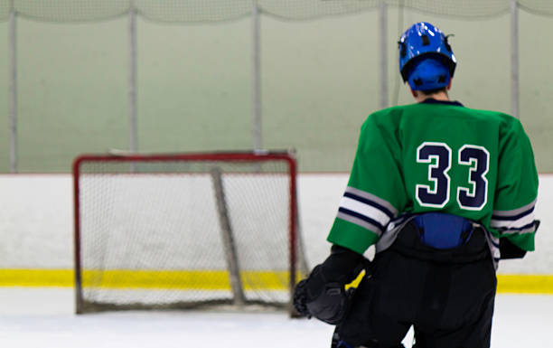 istock Ice Hockey goaltender skates to his net 183070765