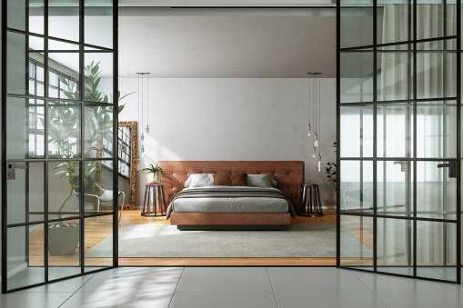 Entrance Of Modern Bedroom With Double Bed, Houseplants,Pendant Lights And Glass Door Opening