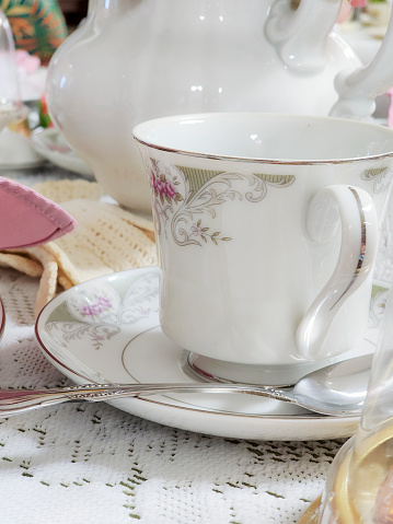 Food and Drink -  Tea Party.  Tables are set and decorated to host a tea party.    Great background images for text.