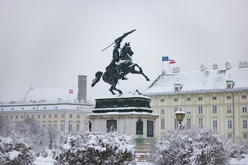 A snow-covered bronze statue of Archduke Karl of Austria in Vienna in Winter