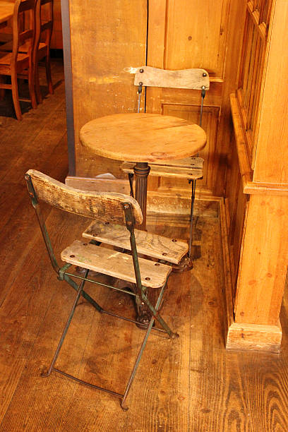 istock Old vintage chairs and table in a bakery 183075532