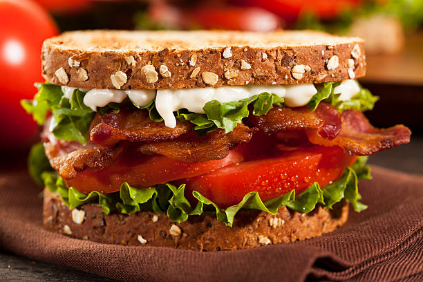 Fresh Homemade BLT Sandwich Fresh Homemade BLT Sandwich with Bacon Lettuce and Tomato mayonnaise photos stock pictures, royalty-free photos & images