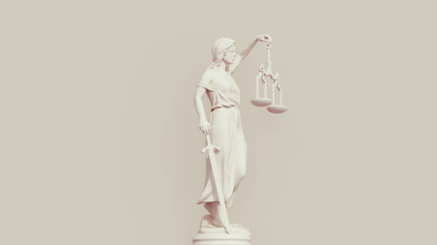 istock Lady justice judicial system scales blindfold sword neutral background soft tones beige brown right side view 1830775556