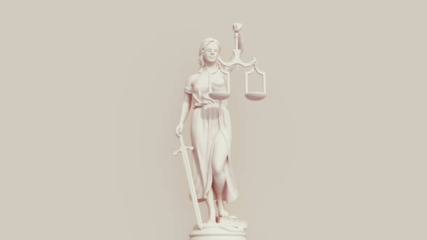 istock Lady justice judicial system scales blindfold sword neutral background soft tones beige brown front view 1830775782