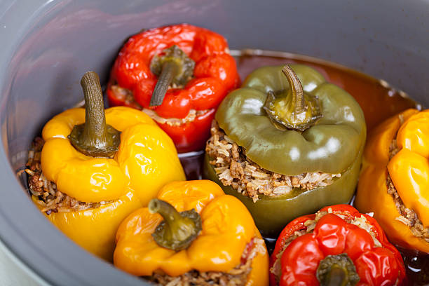 Stuffed peppers Roasted peppers stuffed with meat and rice stuffed pepper stock pictures, royalty-free photos & images