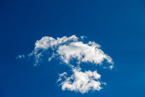 istock Veil cloud in front of a blue sky 1830781773