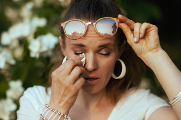istock sad young female in white shirt has allergy attack 1830796174