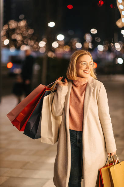 istock Woman with shopping bags 1830809219