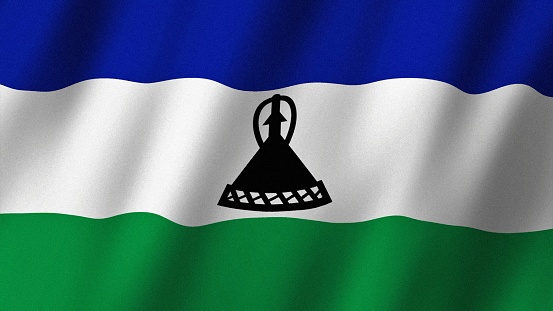 Lesotho flag waving in the wind. Flag of Lesotho images.