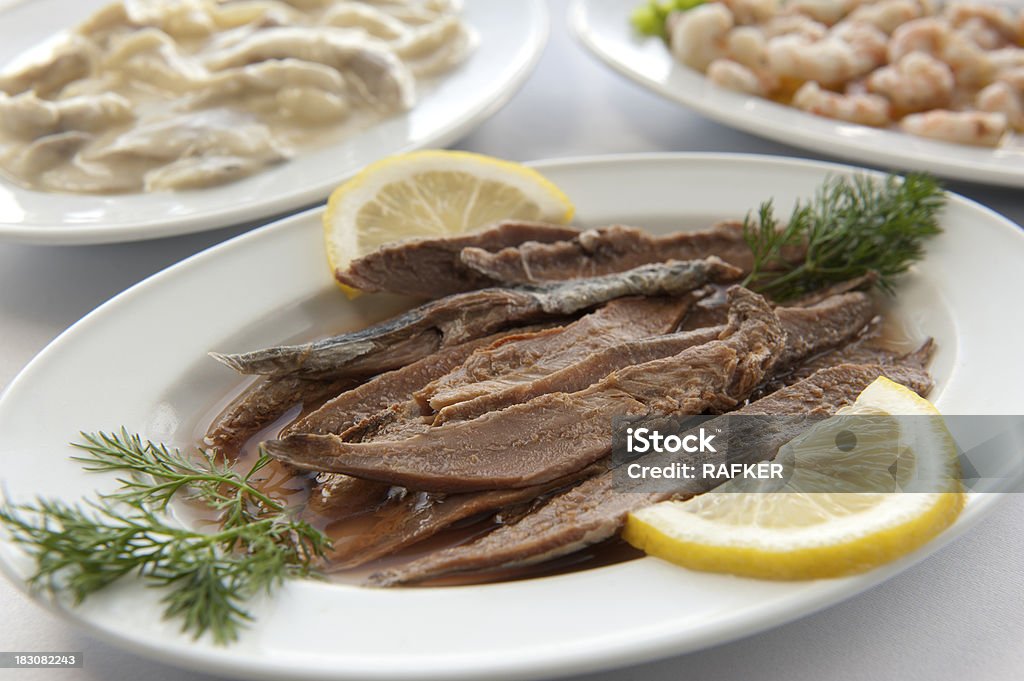 Plato de pescado en la cena - Foto de stock de Alimento libre de derechos