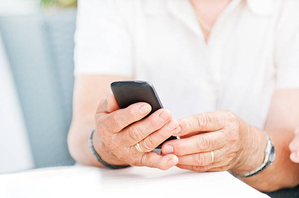 istock Senior woman using smart phone 183082782