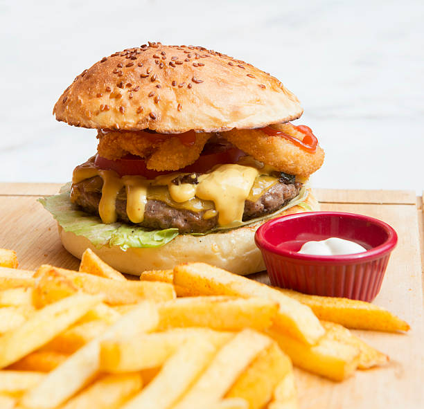 istock hamburger with french fries 183082944