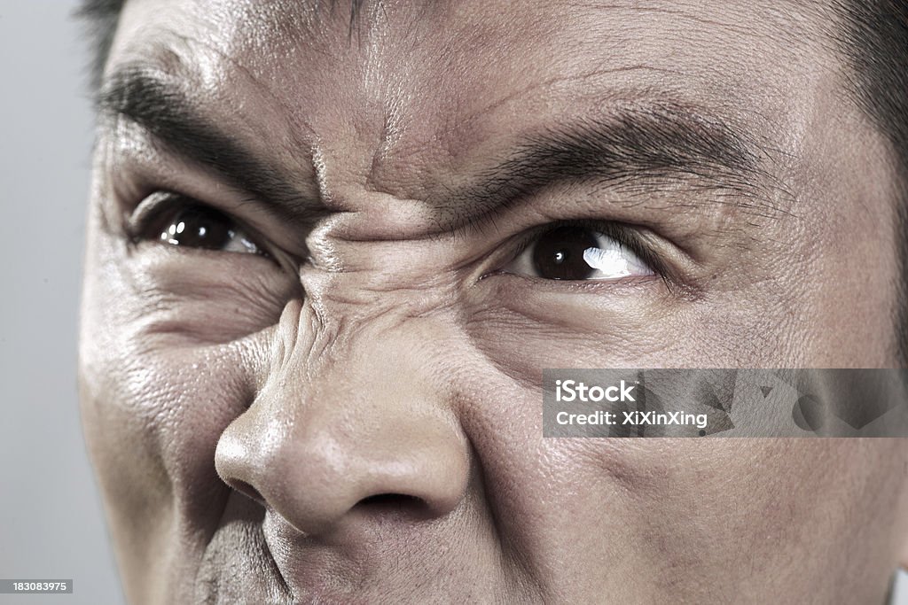 Extremo Close-up do rosto zangado mans - Royalty-free Adulto Foto de stock