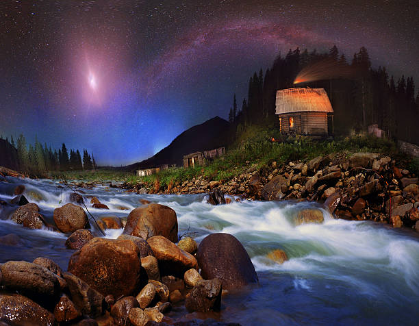 istock Milky Way and the moon over  mountains 183089091