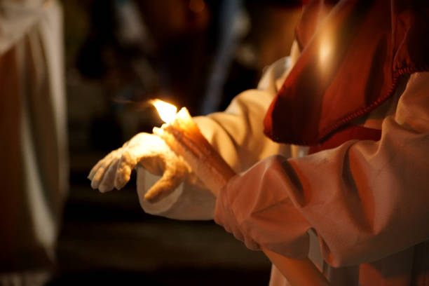 istock A Nazarene hand with a candle in Holy Week 1830907379