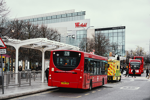 Cannon Street, London, England - October 28th 2023:  Modern London double-decker bus at a bus stop