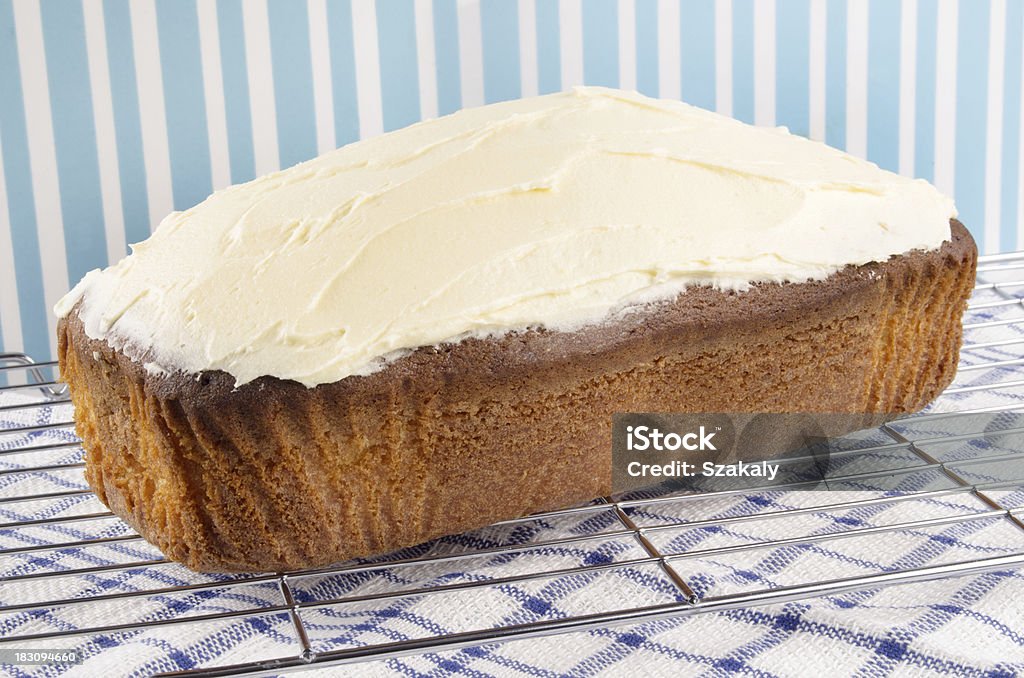 loaf cake with cream cheese icing home made loaf cake with cream cheese icing Baked Stock Photo