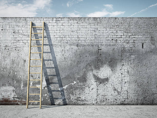 istock Ladder on wall in front of sky 183094835