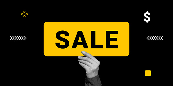 Black Friday, sale, discounts. A hand holds a yellow sign with the inscription SALE on a black background. Minimalist art collage