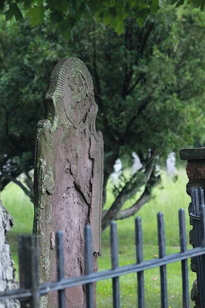 CemeteryTall Broken Brown Stone stock photo