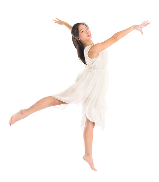 joven chica adolescente asiática contemporánea - women teenage girls jumping dancing fotografías e imágenes de stock