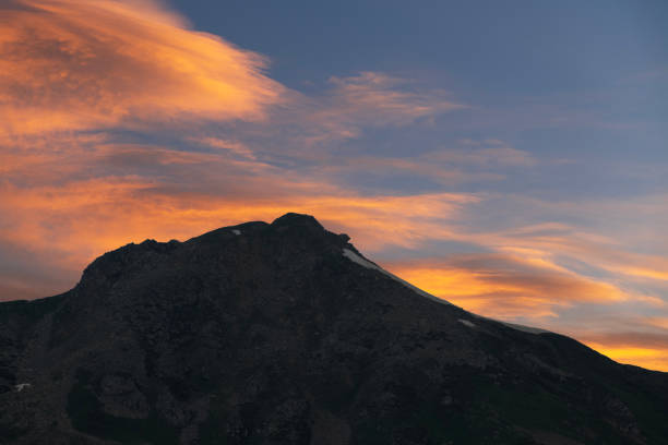 istock Beautiful sunset over the snow covered mountains. 1831032964