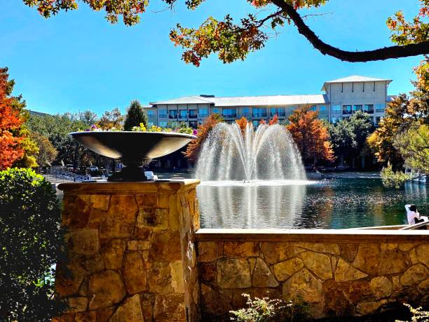 istock Lake surrounded by stone wall at Shops at Legacy 1831074529