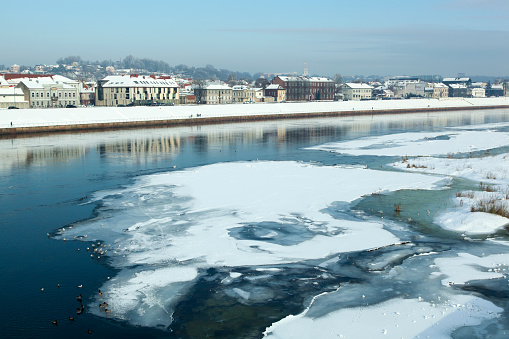 The winter view of half frozen Neman River in Kaunas city downtown (Lithuania).