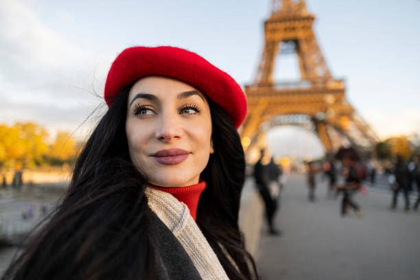 istock selfie woman with beret in paris background eiffel tower 1831115533