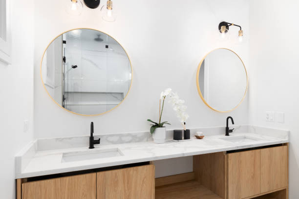 istock A modern bathroom with a white oak cabinet and marble countertop. 1831141542