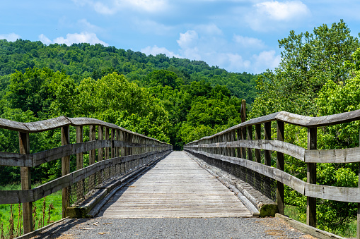 A Long Wooden Bridge on the Bicycle Greenway for the New River Trail State Park in Virginia