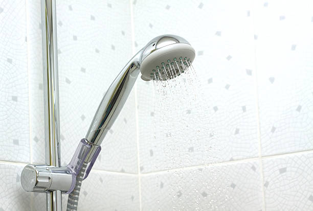 istock Shower in bathroom with running water down 183117252
