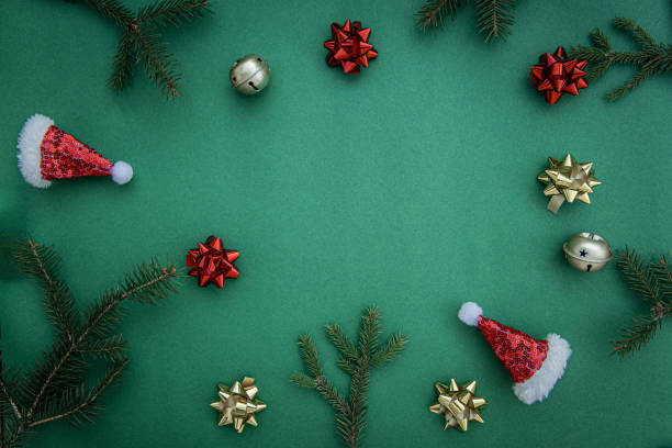 istock Christmas composition. Festive decoration on green background. Flat lay, top view, copy space 1831174991