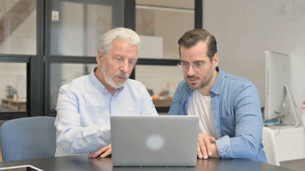istock Business People Working on Laptop in Office 1831222523