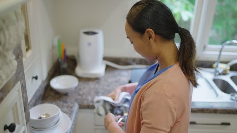 Medical staff washing kitchen dishes